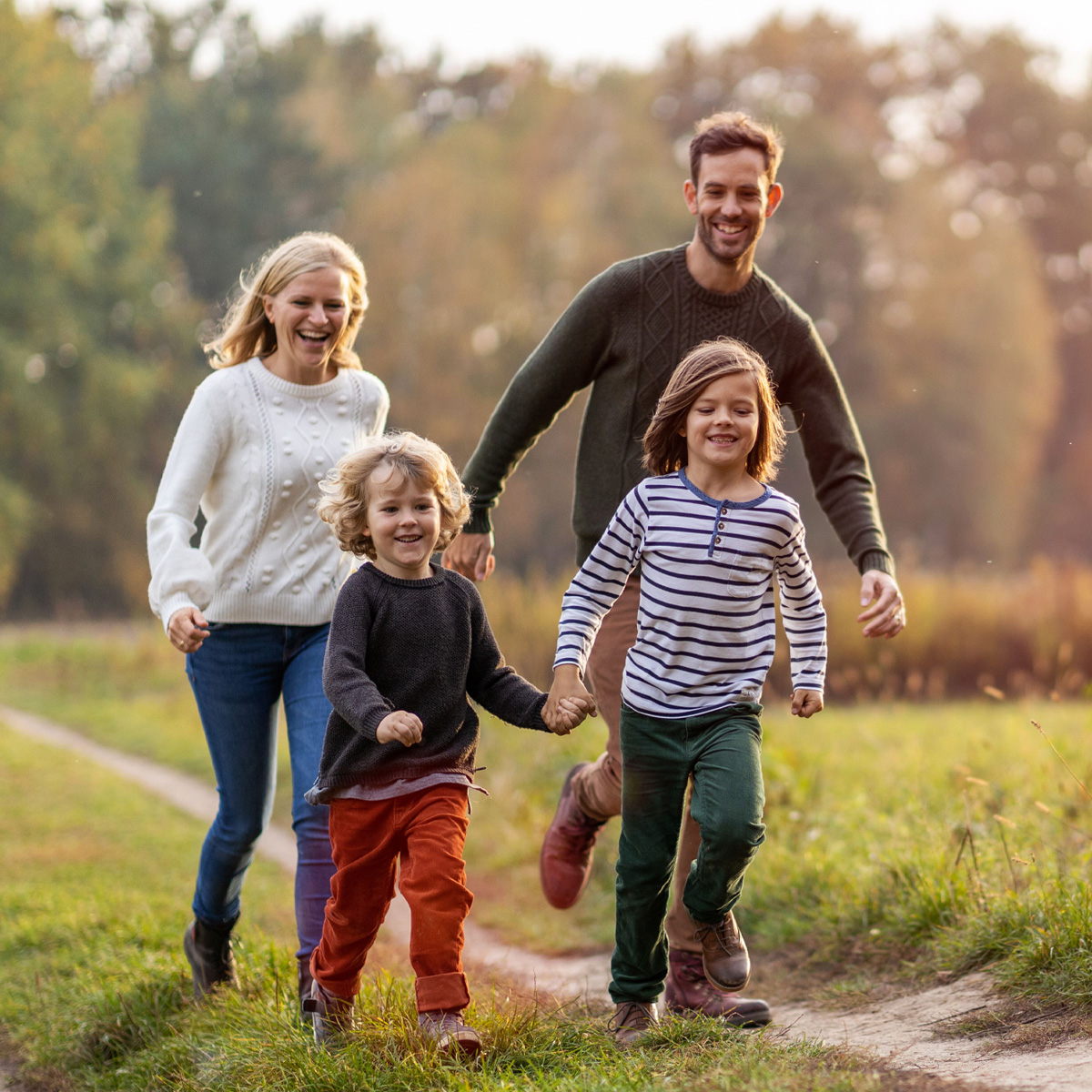 young family having fun outdoors